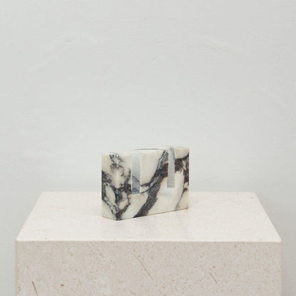 White marble dual candle holder side view